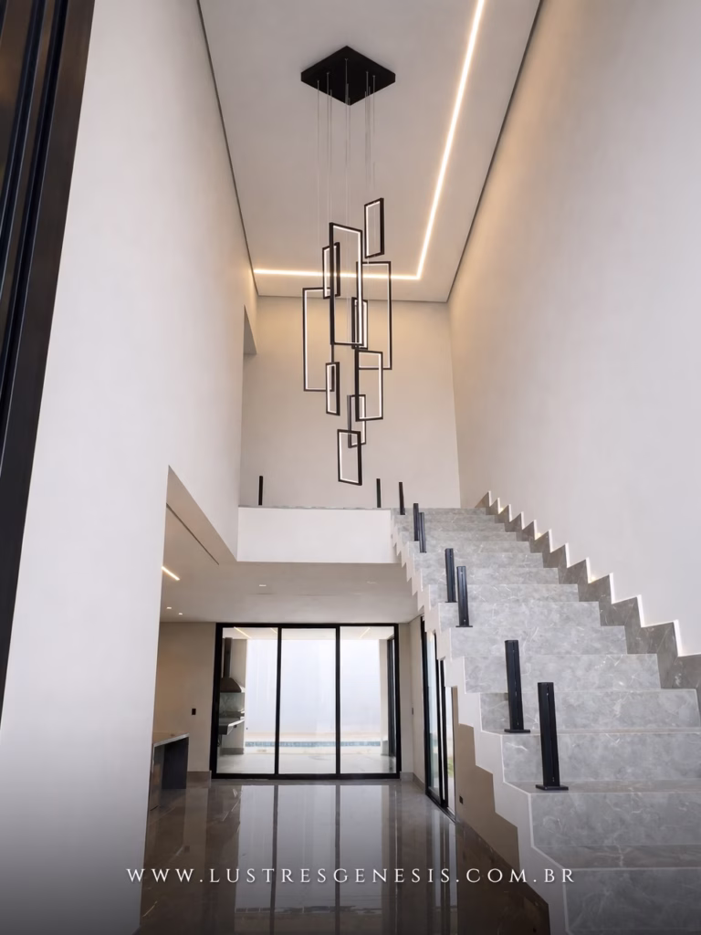 Pendente de LED moderno com 12 retângulos pretos, design minimalista, ideal para pé direito alto em salas de estar, escadas ou hall de entrada.